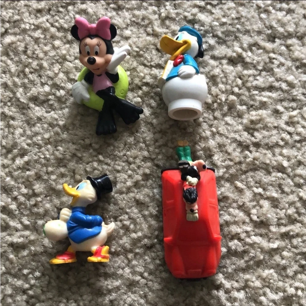 Vintage Disney action figures - daffy, minnie, and goofy